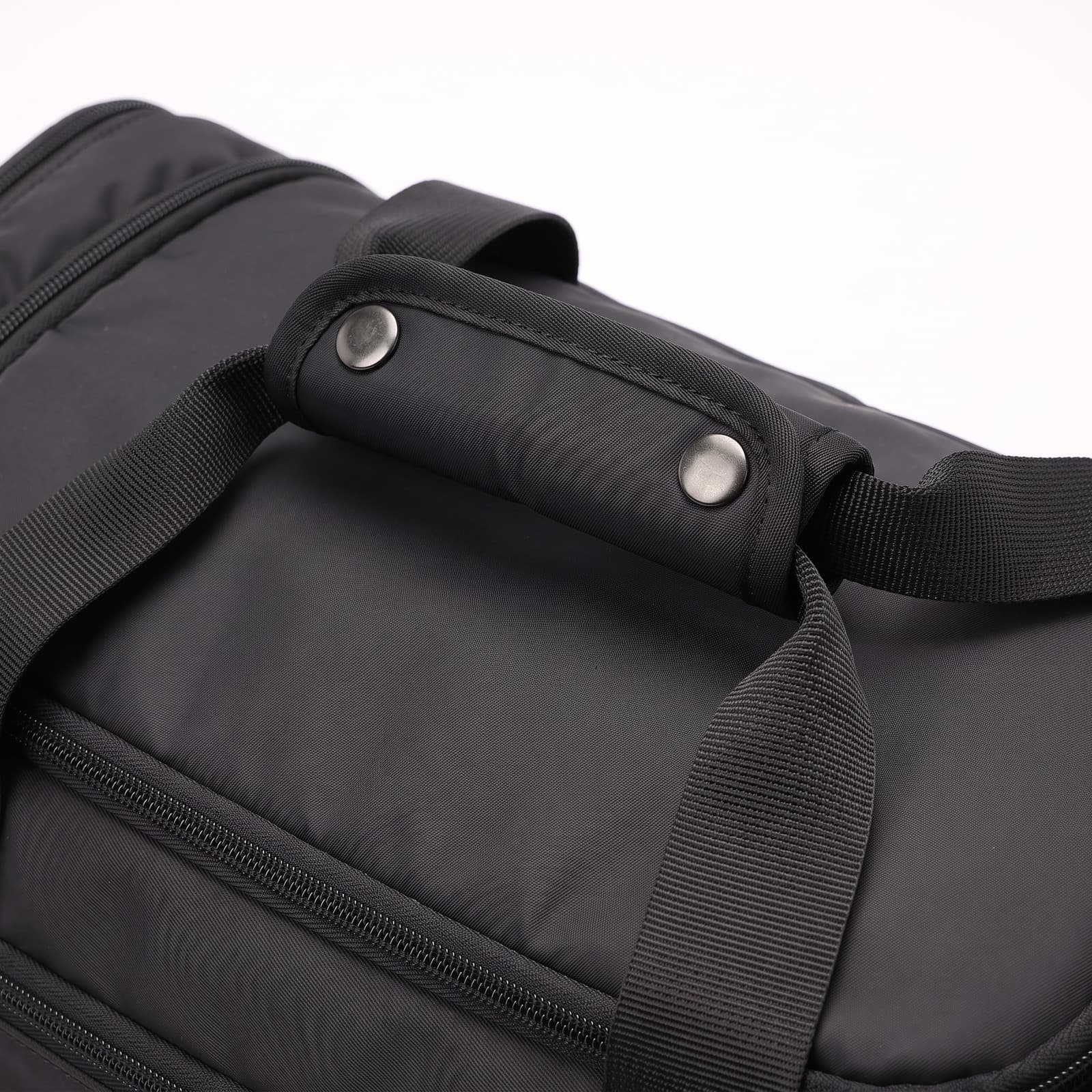 Close-up of the handle wrap and snap on The Original in Matte Black